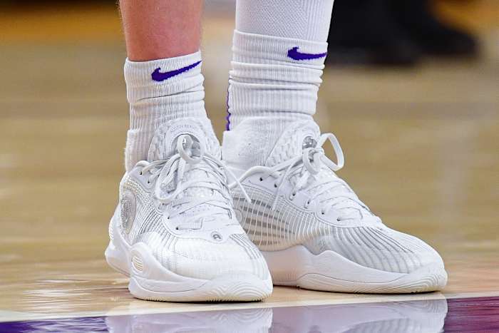 Los Angeles Lakers guard Austin Reaves' white Rigorer sneakers.